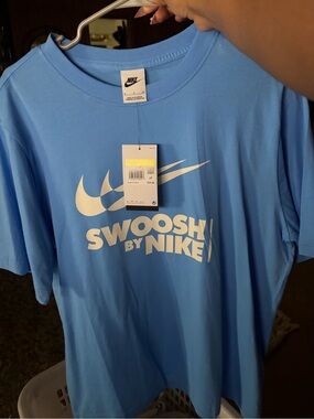 Nike Blue Tee with White Swoosh Graphic